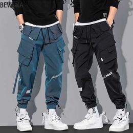 Men's Pants Cargo Pants for Men Hip Hop Casual Pants Ribbons Harem Jogging Pants Spring Multi-Pockets Male Trouser Slim Fit Pantalon Homme YQ240108