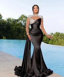 Kristaller boncuklu siyah denizkızı balo elbiseleri şeffaf uzun kollu yüksek boyun ince resmi gece önlükleri modern dubai ünlü parti elbisesi kadınlar için