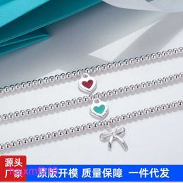 Crfv Designer Tiffanyset Charm Bracelets Seiko Version t Family Love Bow Bracelet Red and Blue Enamel Cnc Steel Seal Peach Heart Pendant Buddha Bead Round Ball B