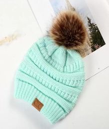 New Year039s Gift 10 Designs Party Favour CC Adult Winter Warm Hat Women Soft Stretch Cable Knitted Pom Beanie Girl Ski Christma1798610