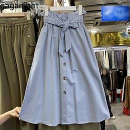 Skirts Gaganight Women Black Ear Edge High Waist Button Bow Tie Up Skirt 2024 Autumn Winter Korean Edition Slimming