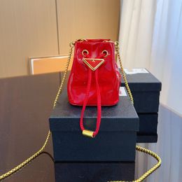 Fashion Patent leather mini pouch Drawstring bucket Bags Luxury Designer Lady Crossbody Chains Bags High Quality Shoulder Bags Elegant and Glittering