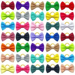 Dog Apparel 100pcs Colorful Bowknot Pet Hair Bows Decorate Solid Color With Rubber Band For Small Dogs Puppy Headwear