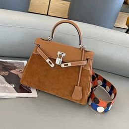 A Kaily 2023 New Swift Cowhide with Frost Leather Panel Contrast Wave Dot Shoulder Strap Handheld Single Oblique Straddle Women