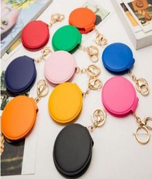 Compact Mirrors 10pcslot Mini PU Leather Pocket Makeup Mirror Portable Key Chain Cosmetic Double For Girls Whole4848019