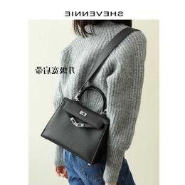 A Kaily Xue Yunni good product with eyes closed wide shoulder strap cowhide matte black silver buckle classic bag versatile for women