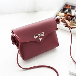 Evening Bags 2024 Women's Korean Edition Mid Length Mobile Phone Bag Bowknot PU Leather Metal One Shoulder Crossbody