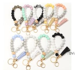 Fedex 9 Colours Wooden Tassel Party Favour Bead String Bracelet Keychain Food Grade Silicone Beads Bracelets Women Girl Keyring Wris5560421