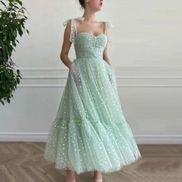 Dresses Mint Green Hearty Prom Dresses Tied Bow Straps Sweetheart Midi Prom Gowns Pockets TeaLength Evening Party Dress