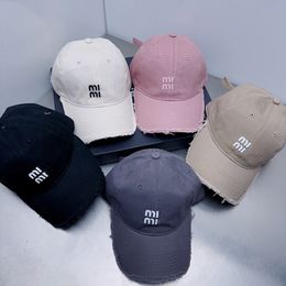 New fashion hole broken burlap cap men and women with the same luxury fashion brand-name baseball cap solid colour letter printing men's ball cap women's sun hat