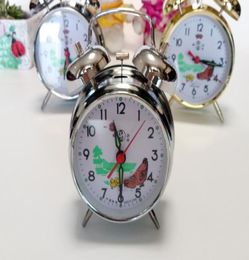 Modern mechanical alarm clock manually winding silver Colour good quality5183839