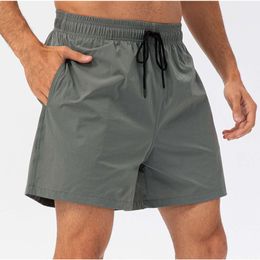 "Men's Quick Dry Yoga Shorts with Back Pocket - Lightweight Gym Jogger Pants for Sports, Running, and Casual Wear - Includes Mobile Phone Pocket"