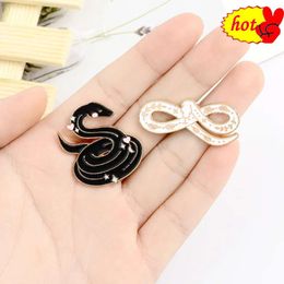 Black Snake White Enamel Pins Custom Myth Brooches Bag Clothes Lapel Pin Badge Animal Jewellery Gift for Kids Friends