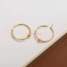 Designers jewels CELI French Saijiasijia earrings celi light luxury design sense brass simple knot big ring earrings