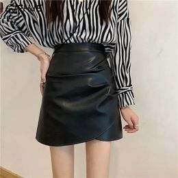 Skirts CJFHJE High Waist Black PU Leather Women Irregular Wrinkles Hip Wrap Zipper Short Skirt Sexy Brown Office Lady Y2k