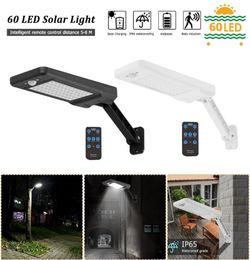 60 LED Solar Light PIR Motion Sensor IP65 Outdoor Garden Wall Dimmable Lamp Solar Lamp Remote Controller Manual9848949