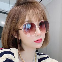 Fashion design frameless sunglasses female 2024 European and American Ins network red irregular cut sunglasses trend street photography travel UV400 glasses