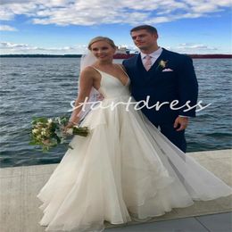 Sexy Ivory Beach Wedding Dress A Line Deep V Neck Country Bridal Dresses 2024 Backless Floor Length Tulle Bride Dress Elegant Spaghetti Straps Garden Vestios Novias