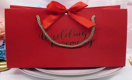 Highquality gifts Bow gift bag Portable paper bag Wedding supplies Tote bag wrapping paper bags with handle9863194