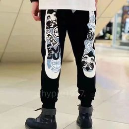 European american designers slim star jeans with the same style Men printed slim fit small straight patch hole beggar pants retro long pants