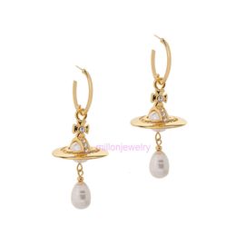 viviane westwoodly earrings Saturn Baroque Pearl Earrings Unique Design Instagram