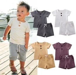 INS Whole Baby Kids Girls Boys Children Clothing Sets Cotton Suits Short Sleeve Front Buttons Tops Straps Shorts 2Pieces Summe4769998
