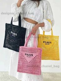 Totes New spring and summer hollowed-out one-shoulder embroidered letter paper rope str woven bag women's portable beach ba T240112