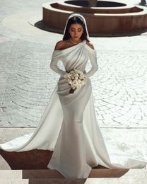 2024 Sexy Mermaid Wedding Dresses African One Shoulder Summer Beach Crystal Beads Long Sleeves Detachable Train Satin Vestidos De Novia Bridal Gowns Overskirts