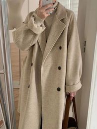 Kvinnokläder 2023 Ny vinter tjock lång jacka med en solid lapeljacka Koreansk modesversion Wool Jacket 240112