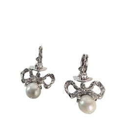 vivianeism westwoodism earrings Full Diamond Bow Pearl Saturn Earrings Womens Light Luxury Grade Earrings Elegant Ver99*-9*8