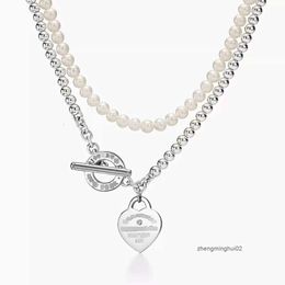 Tiffanyanynecklace classico popolare S925 Sterling Sterling Ot Li strato Pendente a forma di cuore perla con collana di diamanti per donne