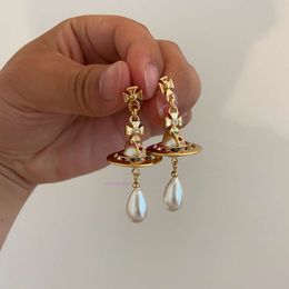 vivianeism westwoodism earrings earrings 3D Saturn Water Drop Artificial Pearl Earrings Punk Earrings Female