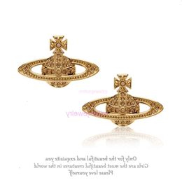 vivianeism westwoodism earrings earrings threedimensional Saturn earrings full of diamonds white stones delicate plane