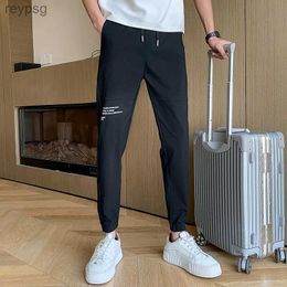 Men's Pants Men's casual pants black jogging pants patchwork design covered cut simple fully matched fashionable summer clothing new FJ362023 YQ240115