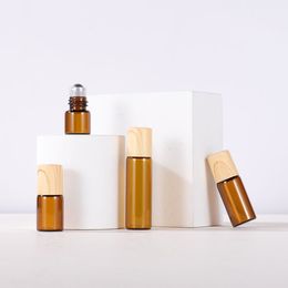 1200pcs/lot Amber Essential Oil Roller Bottles Portable 1-5ml Glass Roll On Refillable Bottles With Metal Ball Plastic Wooden Grain Cap