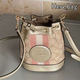 2024 New Dempsey Mini Drawstring Bucket Bag Fragrant Blae One Shoulder Crossbody Handheld Old Flower Wanderercode