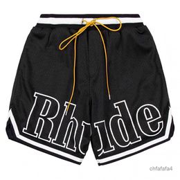 Designer Shorts Rhude Men's Capsule Summer Beach Pants Mesh Material Breathable Sweat Loose Fitness Basketball Mens Short Black 5FT6
