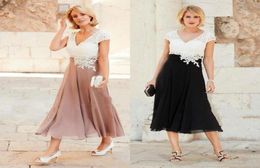 Modern Dusty Pink Outdoor Mother Of The Bride Dresses Top Lace Cap Sleeve V Neck Tea Length Country Groom Mom Dress Keyhole Back W1603488