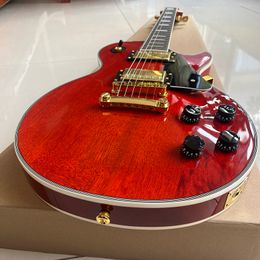 Classic transparent red electric guitar, with high-quality gold hardware, comfortable to touch, moving sound, and fast delivery.