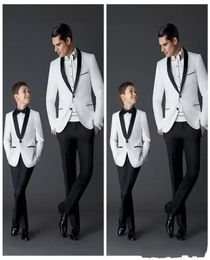 Popular White Boys Formal Occasion Tuxedos Black Shawl Lapel Kids Wedding Tuxedos Child Party Holiday Blazer Suit JacketPantsTi6709136