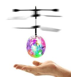new Flying RC Ball Aircraft Helicopter Led Flashing Light Up Toy Induction Toy Electric Toy Drone For Kids Children c0448604264