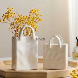 Vases Minimalist Handbag Shape Ceramic Vase Creative Plant Pots Desk Decoration Decorative Flower Arrangement Floral Vases Flower Pots YQ240117