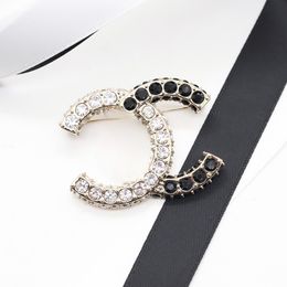 2024 New Round Diamond Black And White Stitching Double Letter Brooch Women's Medieval Senior Sense Diamond Pin Suit Brooch