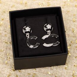 2024 Luxury quality charm drop earring with diamond and black Colour enamel in silver plated have stamp box PS3820A