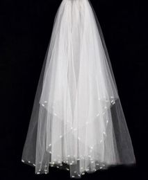 Stunning Newest Bridal Veil Short Soft Tulle Wedding Brides Veils with Exquisite Pearls Cheap High Quality Ivory Bridal Accessorie8550626