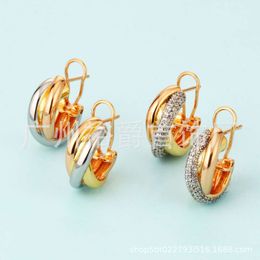 Desginer cartera Three Ring Color Separation Wrapped Earrings Are Fashionable Simple and Personalized in Design. French Diamond Studded Earrings and Ear Buckles