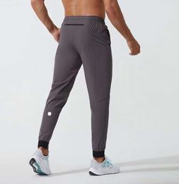 LU womens LL Men's Jogger Long Pants Sport Yoga Outfit Quick Dry Drawstring Gym Pockets Sweatpants Trousers Mens Casual Elastic Waist fitness 558