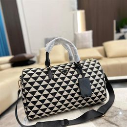 Man Designers 45cm Embroidery Duffle Bag Black Beige Fabric Travel Bags Women Leather Handles Luggage Casual Weekend Tote With Nylon Leather Shoulder Strap 3012