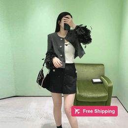 Designer Skirts High version Nanyou P family half skirt for women in winter pure desire style slim appearance high waist button short style buttocks wrapped half skir
