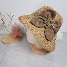 Womens Casual Bowknot Woven Straw Hat Designer Handmade Woven Bucket Hat Ladies Fashionable Beach Vacation Hats Spring Summer Wide Brimmed Hat